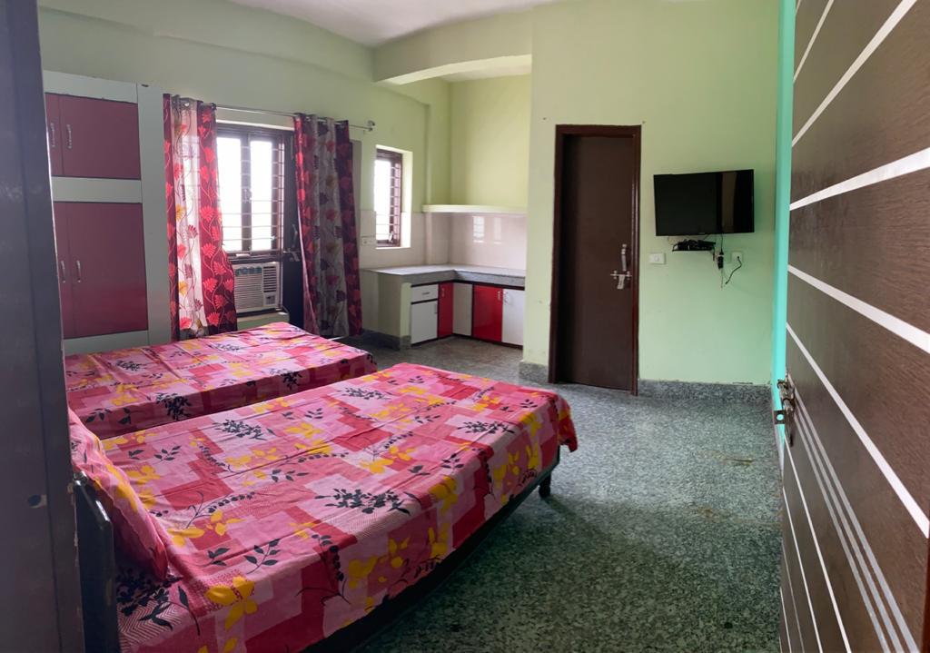 Double Sharing Room at Mahadev Residency